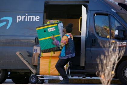 Amazon driver struggles with deliveries. (Copyright 2023 The Associated Press. All rights reserved.)