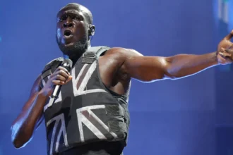 Rapper Stormzy banned from driving for nine months after being caught using his phone