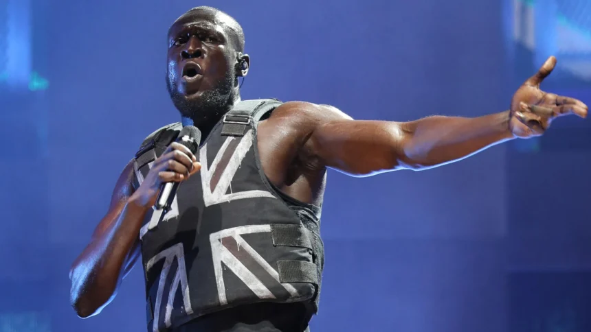 Rapper Stormzy banned from driving for nine months after being caught using his phone